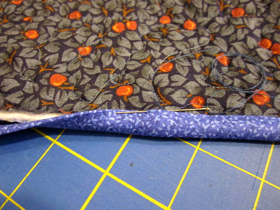 Sewing binding to the back